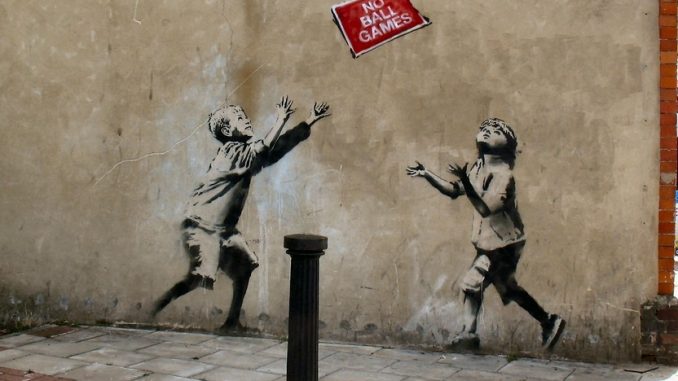 Banksy children playing