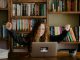Teenager learning at laptop