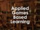 Applied Games Based Learning text on workshop background