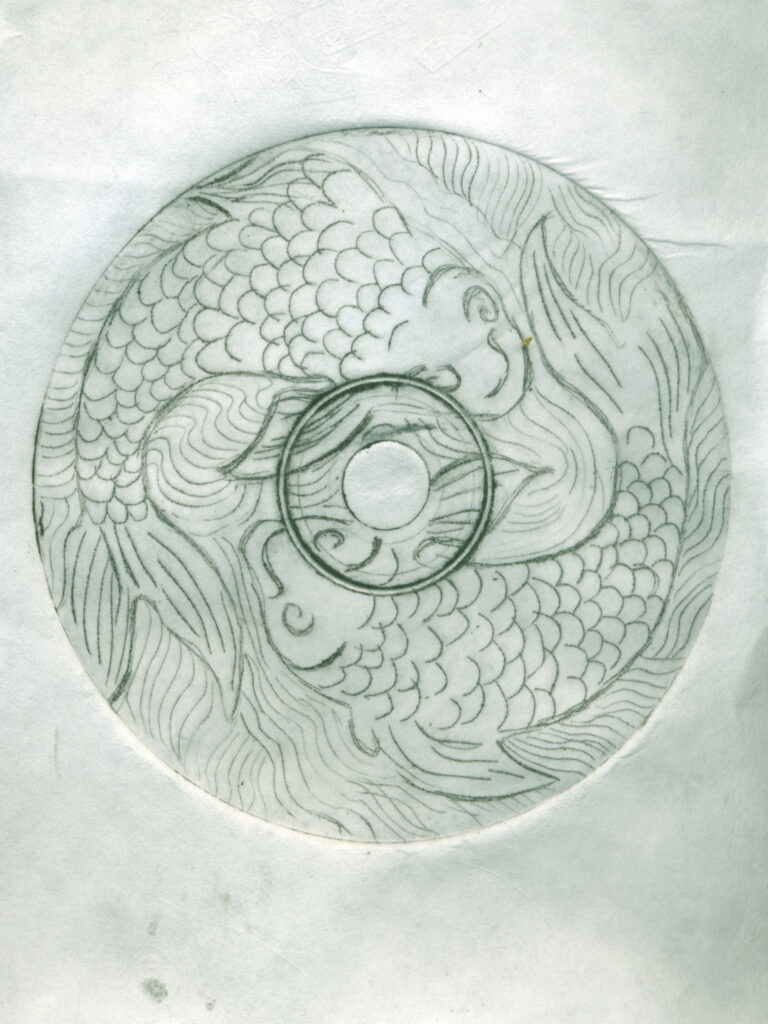 A a drypoint print from a recycled CD - two fish chasing each other's tails. Pisces